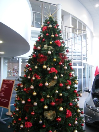 10 foot high traditional red and gold christmas tree